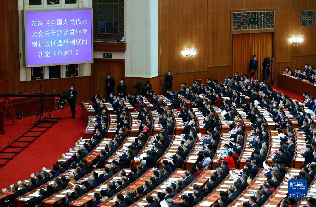 国家最近新闻100字_国内生产总值突破百万亿大关_2021年国内十大新闻