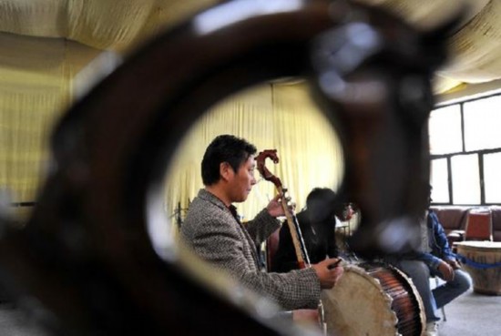 推动社会主义文化大发展大繁荣_深化文化体系体例改革_文化产业 国民经济支柱性产业