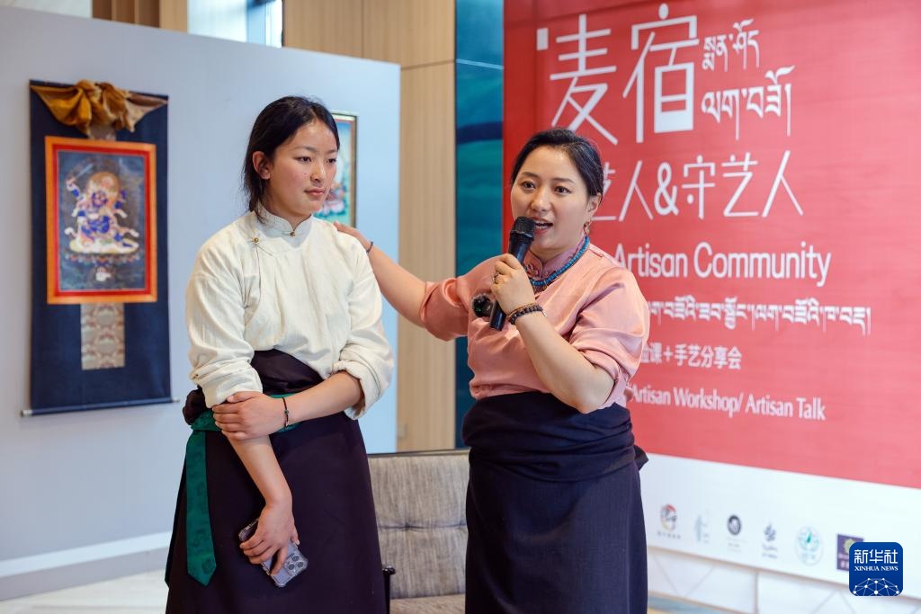 达瓦卓玛结婚照_达瓦卓玛钦乐工坊 四川甘孜藏族自治州德格县麦宿镇 唐卡绘画编织土陶木雕