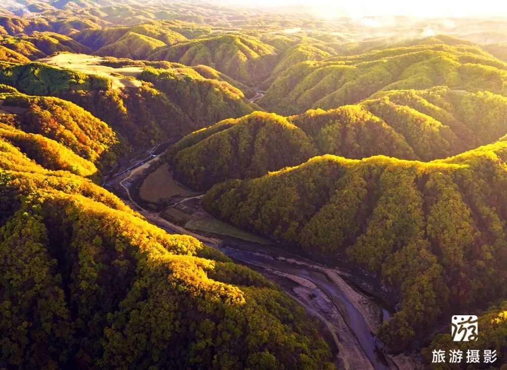 中国北方第一漂_抚顺红河谷漂流电话_清原红河峡谷漂流景区
