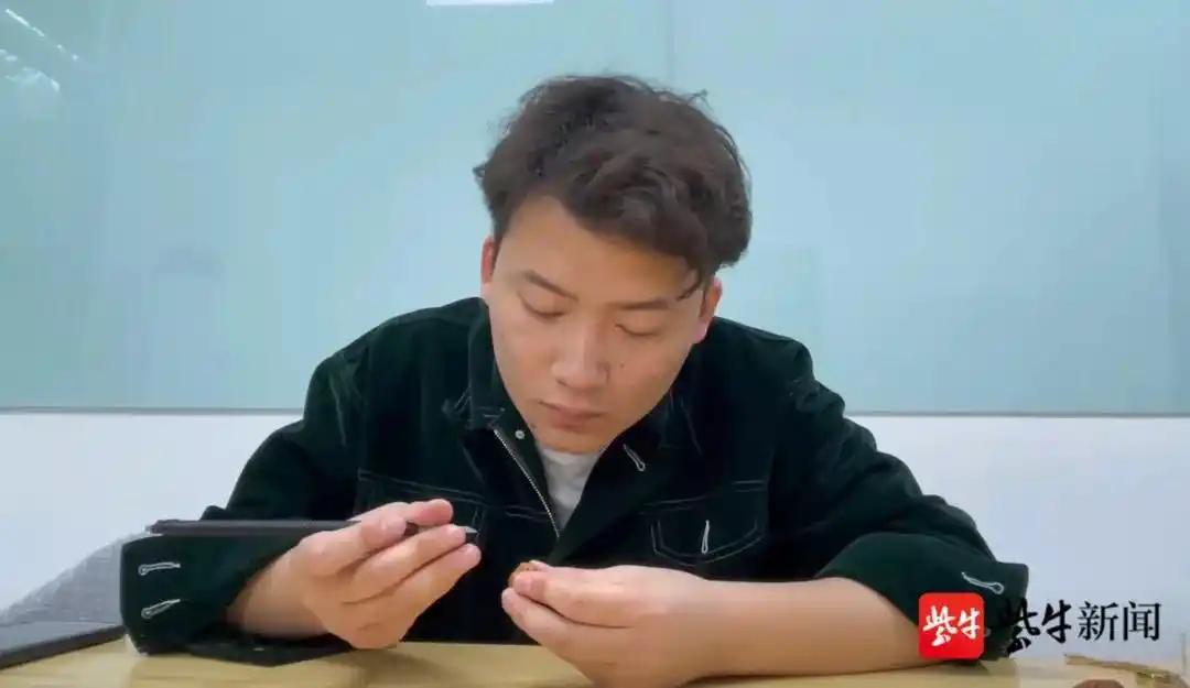 江苏淮安橄榄核雕刻西游记 刘成龙 橄榄核雕刻西游人物_橄榄核龙雕