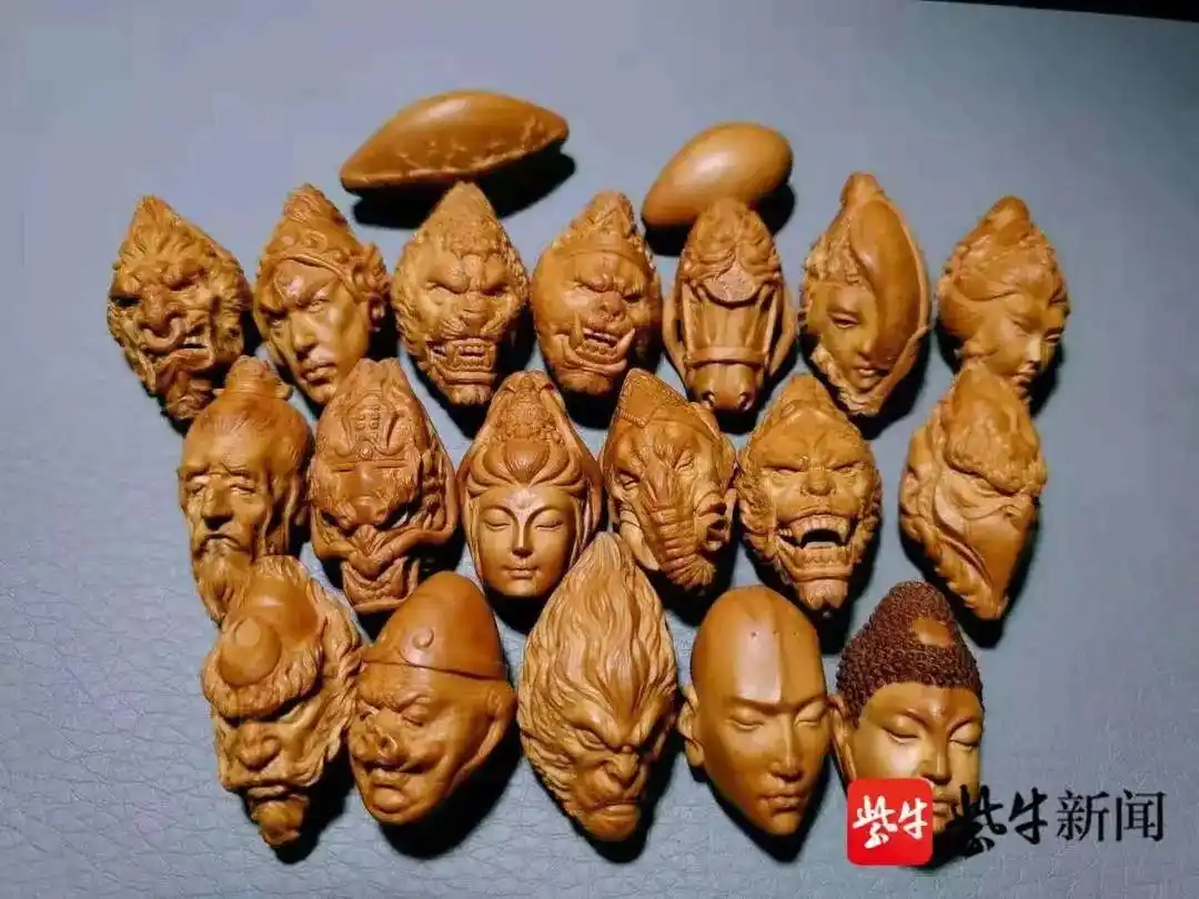江苏淮安橄榄核雕刻西游记 刘成龙 橄榄核雕刻西游人物_橄榄核龙雕