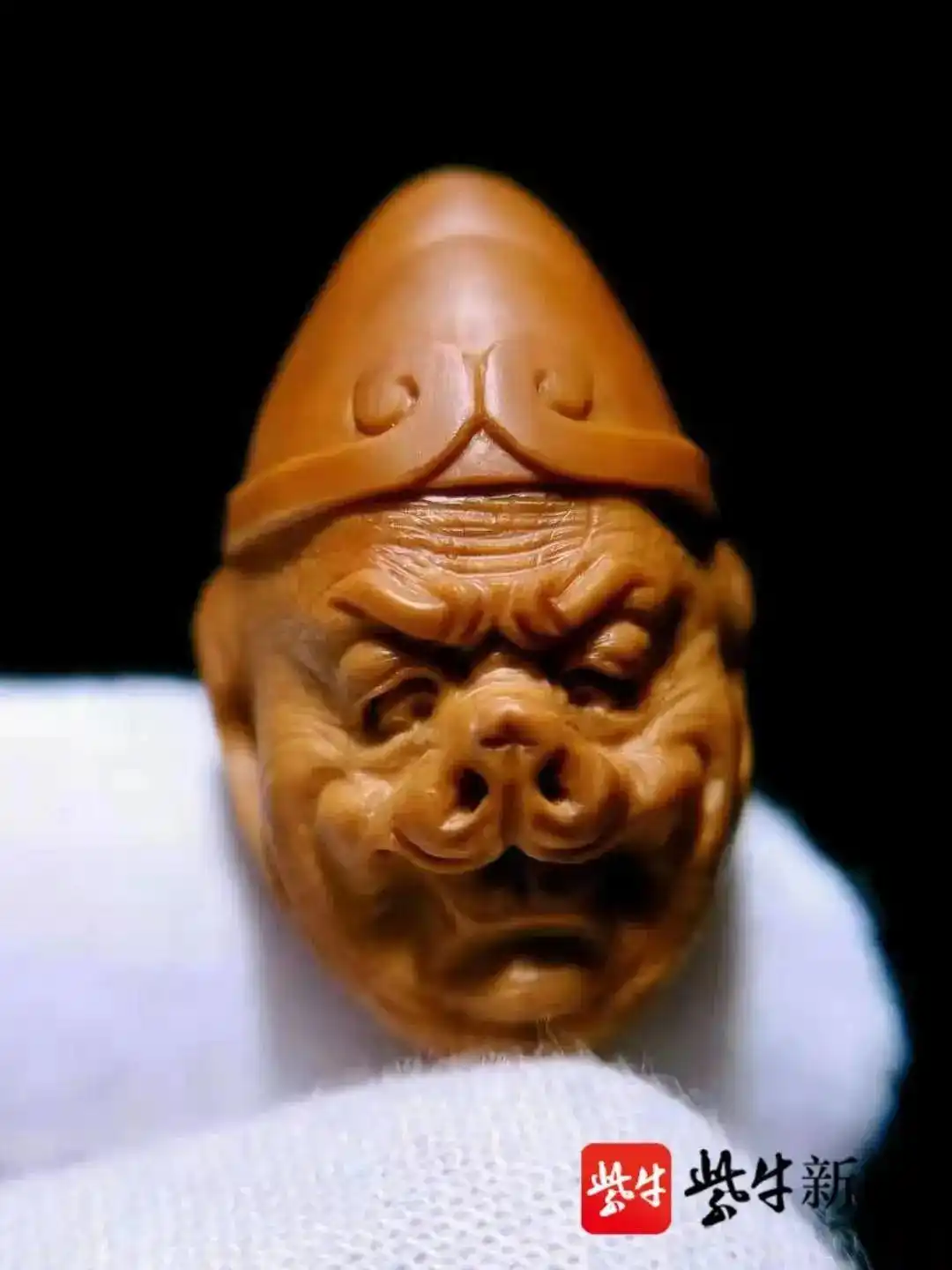 橄榄核龙雕_江苏淮安橄榄核雕刻西游记 刘成龙 橄榄核雕刻西游人物