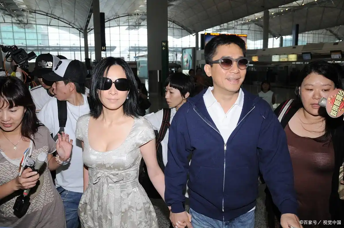 刘嘉玲梁朝伟街拍_梁朝伟刘嘉玲婚姻故事_梁朝伟与刘嘉玲的婚礼